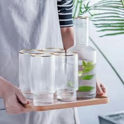 Juego de jarra de vidrio y 4 vasos estilo europeo dorado