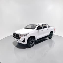 Toyota Hilux Blanca Escala 127 - Miniatura Coleccion