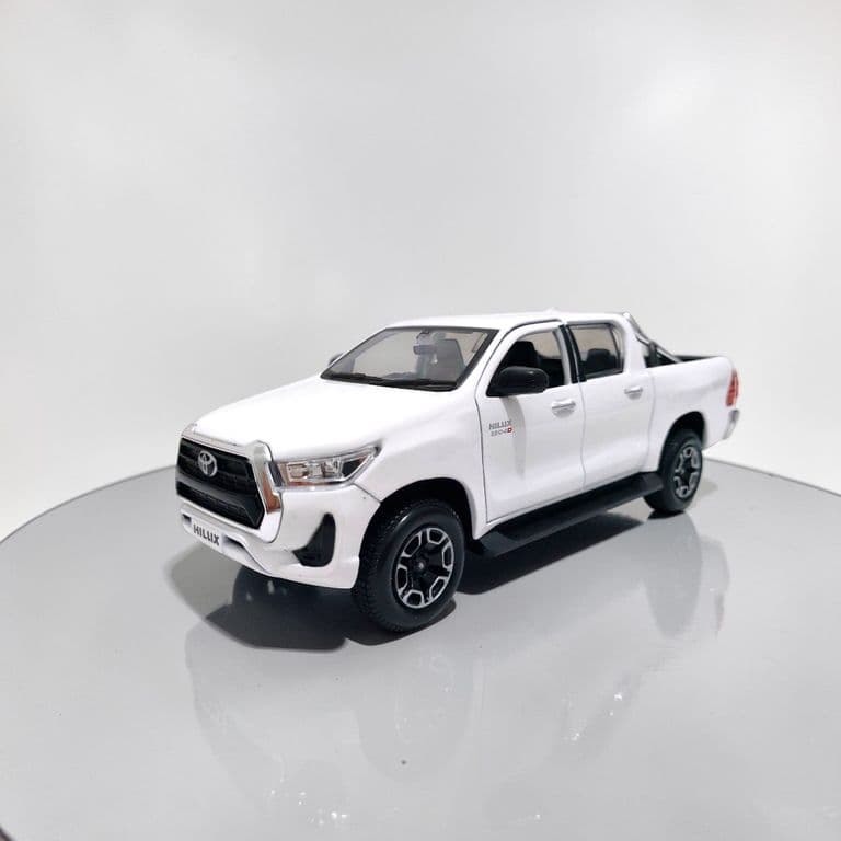 Toyota Hilux Blanca Escala 127 - Miniatura Coleccion
