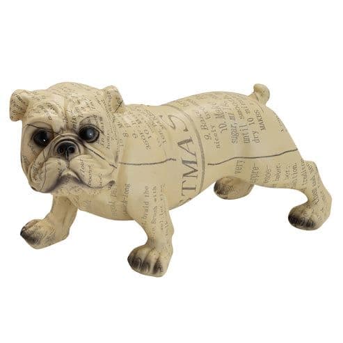 Adorno resina perro diario 26x13x13 cm. Crema
