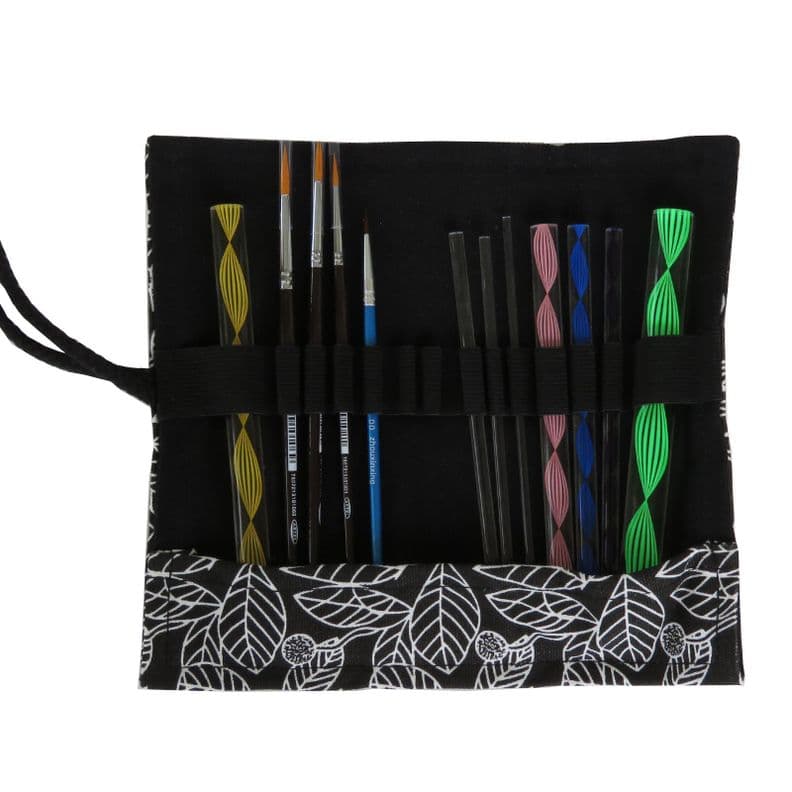 Estuche rollo, pinceles y puntillismo